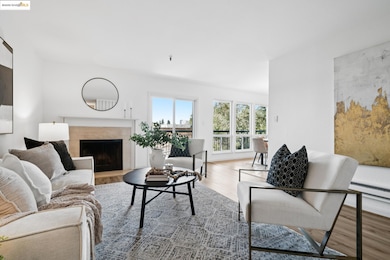 Living room featuring wood finished floors and a fireplace