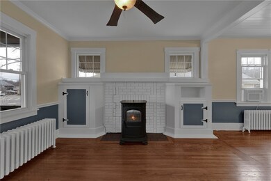 Living room fireplace with built ins and pellet st