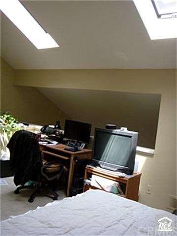 large bedroom provides plenty of room for an offic