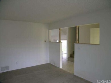 Looking from the living room toward the entry.
