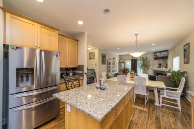 Kitchen opens to dining area