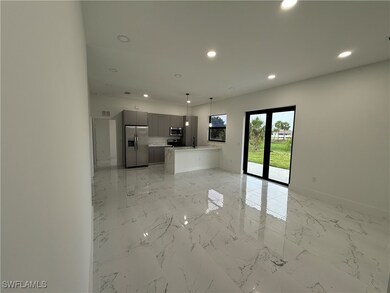 Unfurnished living room with recessed lighting and