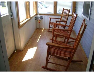 Exterior Front. Enclosed porch to...