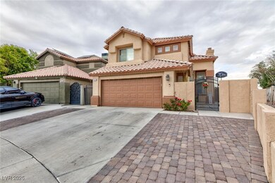 Mediterranean / spanish-style house featuring a ti