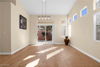 Unfurnished dining area featuring plenty of natural light and light wood finished floors