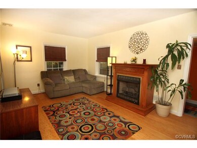 Living room with gas fireplace.