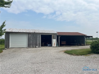 24 x 40 pole barn with concrete floors and garage