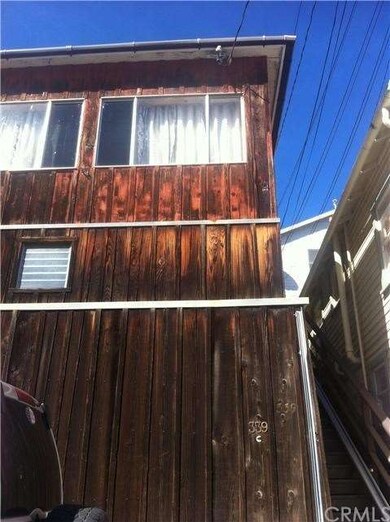 Exterior front view of property w/ lower level sto