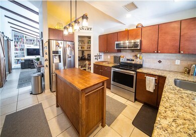 Kitchen upgrades include granite counter tops, a p