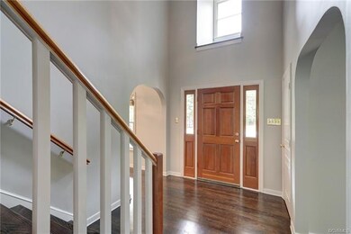 You are welcomed into a stunning 2-story Foyer wit