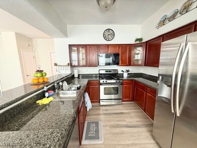 Kitchen with appliances with stainless steel finis