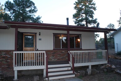 Front porch of home on Oliver