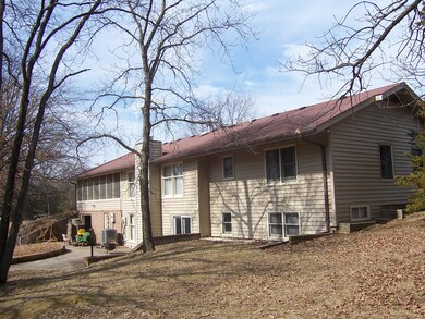 Back of home with patio
