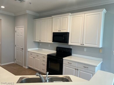 12859 Carrington Cir unit 201, Naples, FL 34105 - photo 6