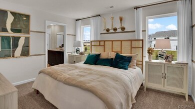 Bedroom with light carpet