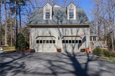 Attached two car garage and wide paved driveway.