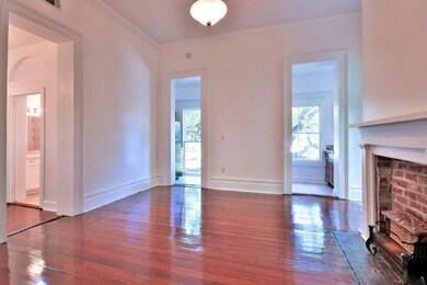 Living area opens onto kitchen.