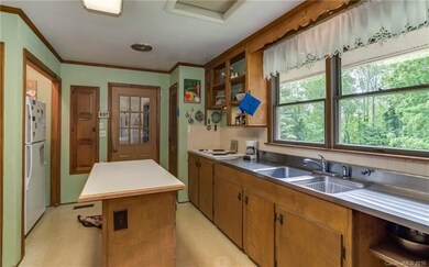 Kitchen with stainless sink & counters