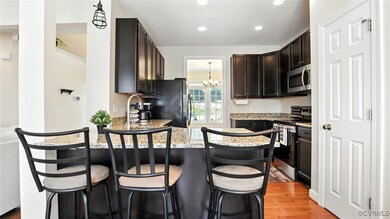 Kitchen with appliances with stainless steel finis