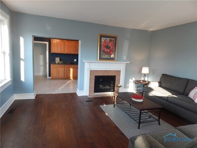 Spacious living room with new wood laminate floori