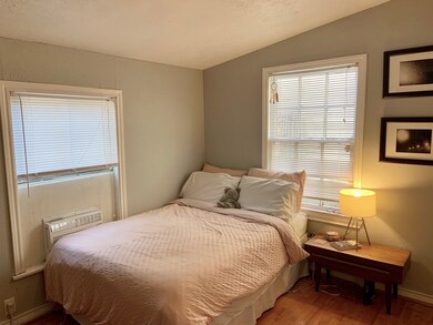 Separate bedroom with nice natural light.
