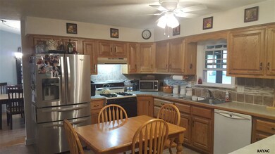 Spacious kitchen with room for table and counter w