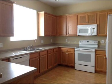 9750 Simeon Dr, Land O Lakes, FL 34638 - photo 2