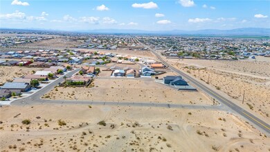 Aerial view of residential area with mountains and