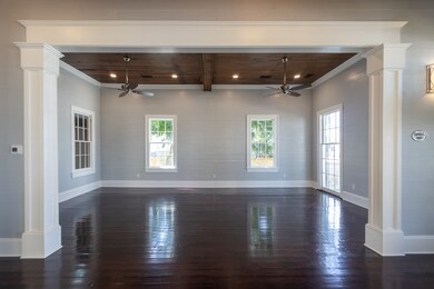 Looking through the foyer into the Living/Dining r