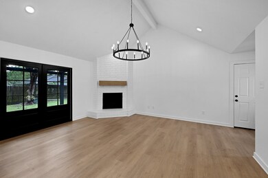 Wood burning fireplace is a crown jewel of the living room