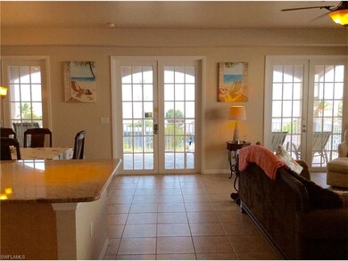3 SETS OF FRENCH DOORS PROVIDING DIRECT VIEW OF TH