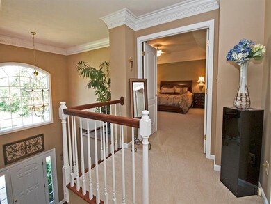 Upper landing provides expansive views to entry an