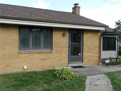 Well maintained brick, roof, and lovely front leve