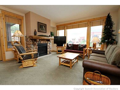 Living Room. Windows surround you in this large li
