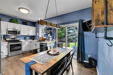 Updated kitchen with hardwood floors and stainless steel!