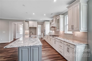 Kitchen with view to Foyer