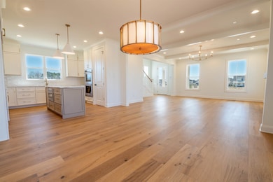 Interior space featuring recessed lighting, a kitc