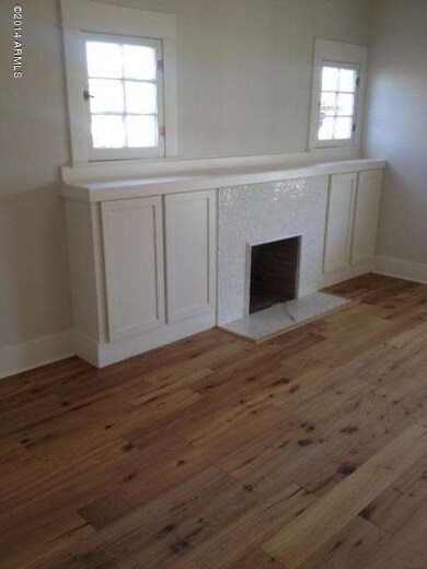 Living room with Calcutta marble f/p
