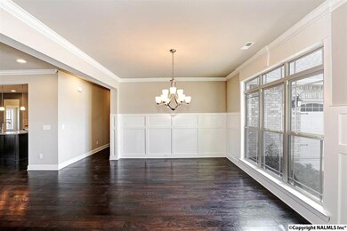 Beautiful hardwood, 60' craftsman style wainscoting, and gorgeous natural light.