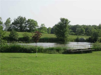 Exterior Front. 1 acre Pond