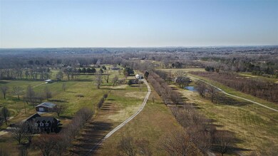 The home sits well back off the road at the end of it is gently winding driveway.  It's beautiful here and very close to two boat ramps to access the Cumberland River.