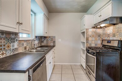 Kitchen has Built- in for a microwave or storage. 