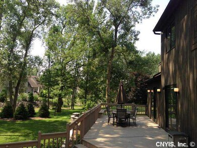 Patio/Deck. Family room and kitchen sliders open t