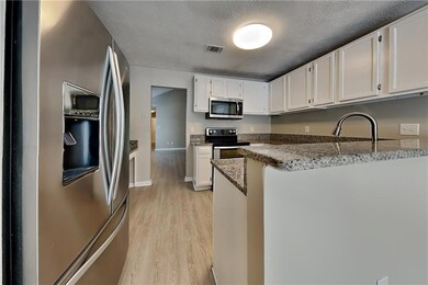 Kitchen featuring light hardwood / wood-style floo