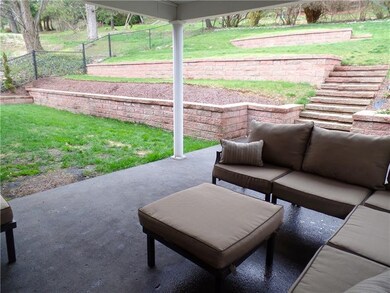 Professionally landscaped, newer retaining walls c