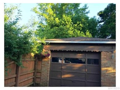 Garage. 1 car detached garage with brick front. Be