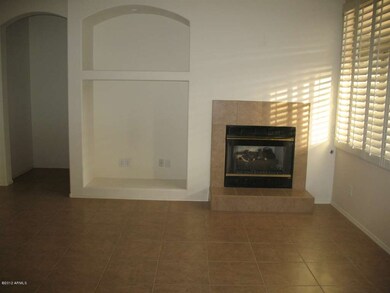 FAMILY ROOM TOWARDS FIREPLACE AND ENTERT