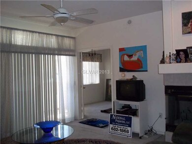 Living Room. Living room and entry to master bedro