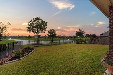 As you step out back you are welcomed by this stunning lake view.