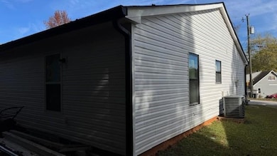 View of property exterior with central AC